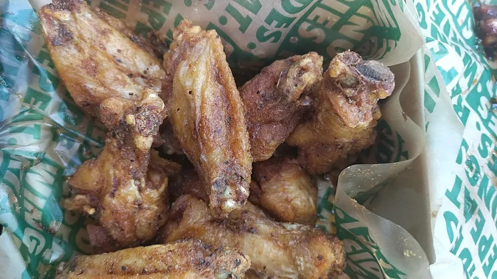 Wingstop food and storefront view at 1307 E Pass Rd in Gulfport, Mississippi