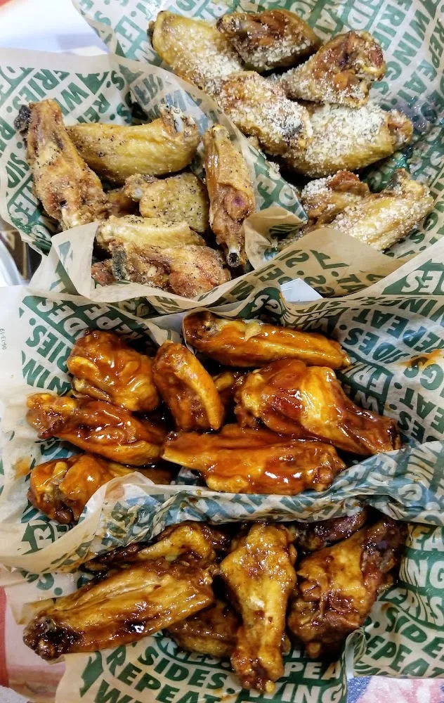 Wingstop food and storefront view at 398 Highway 51 N Ste 40 in Ridgeland, Mississippi