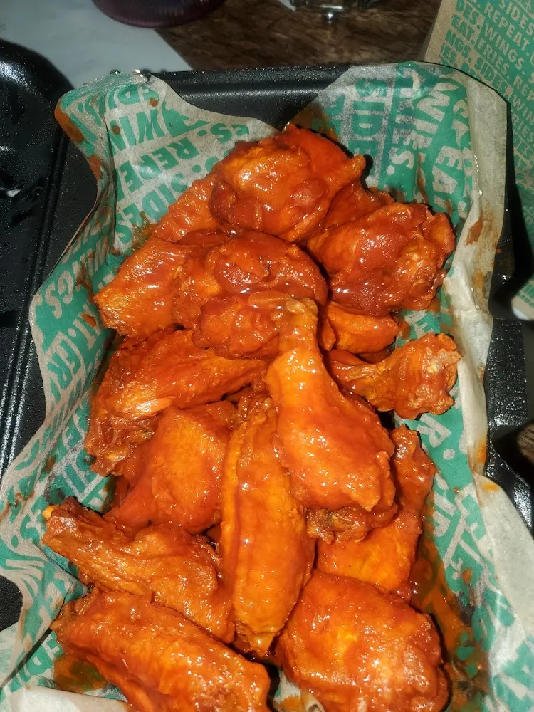 Wingstop food and storefront view at 2310 Iowa Blvd. in Vicksburg, Mississippi