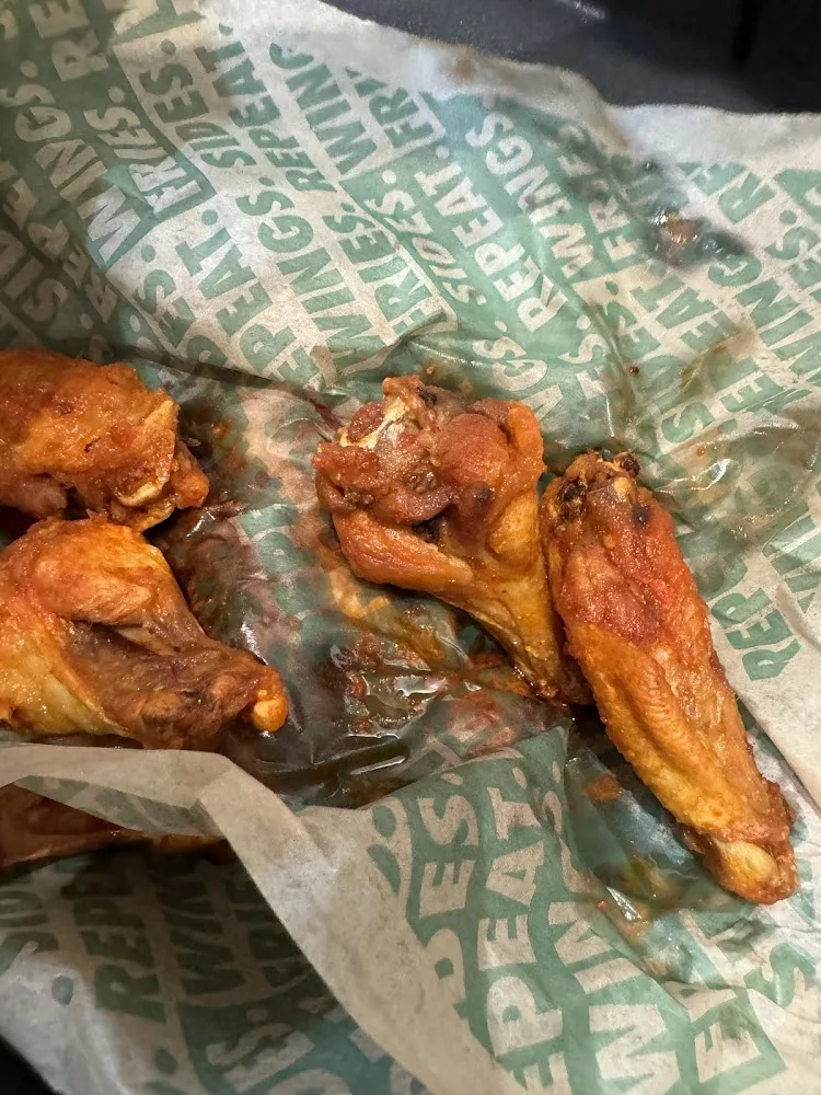 Wingstop food and storefront view at 168 Tunnel Road in Asheville, North Carolina