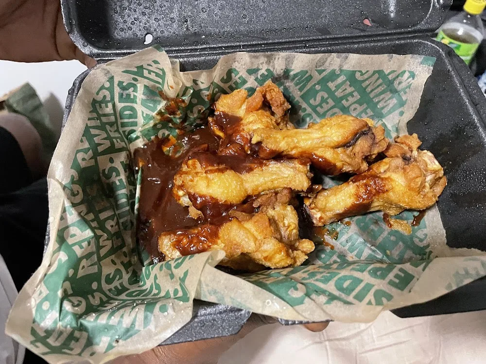 Wingstop food and storefront view at 649 Huffman Mill Rd Ste 103 in Burlington, North Carolina