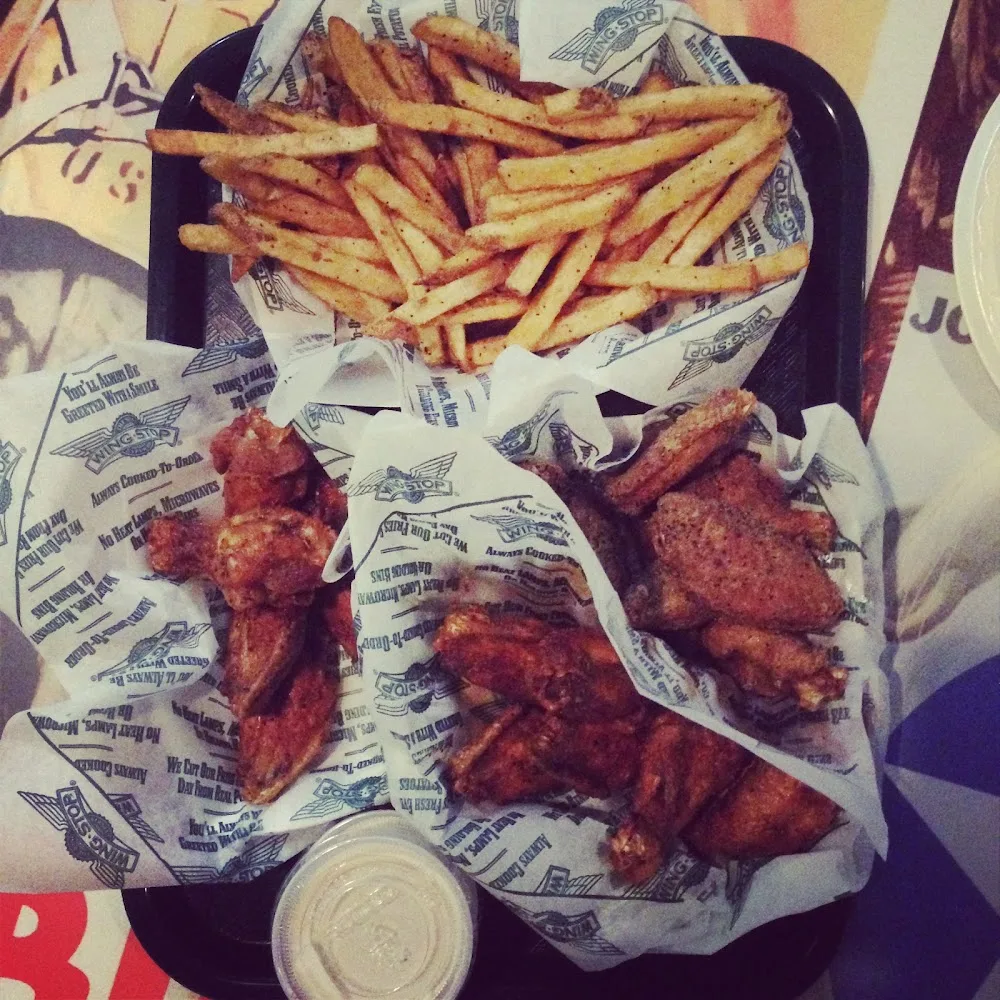 Wingstop food and storefront view at 9211 N Tryon St Ste 14 in Charlotte, North Carolina