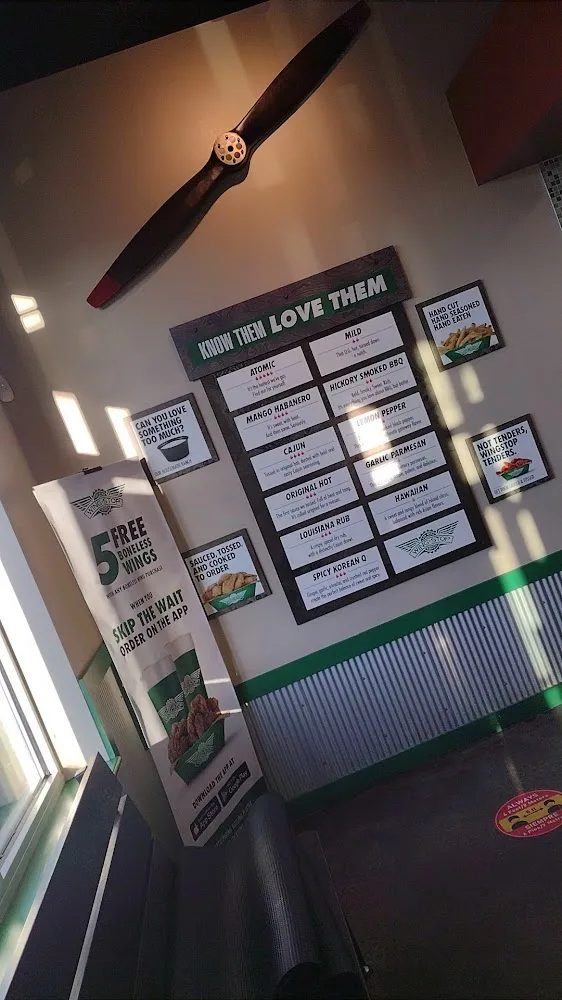 Wingstop food and storefront view at 3240 Wilkinson Blvd Ste C-1 in Charlotte, North Carolina