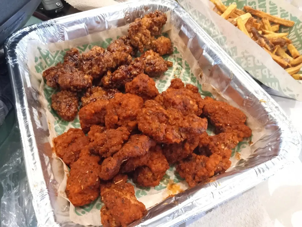 Wingstop food and storefront view at 4010 Durham Chapel Hill Blvd. in Durham, North Carolina