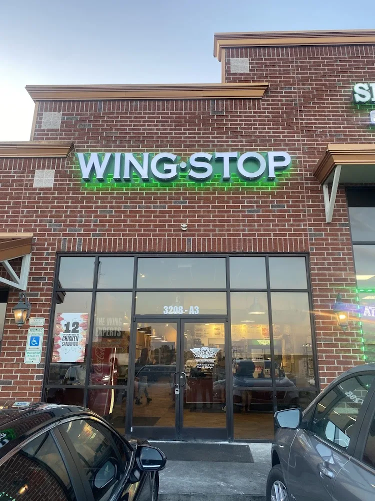 Wingstop food and storefront view at 3208 W. Gate City Blvd A-3 in Greensboro, North Carolina