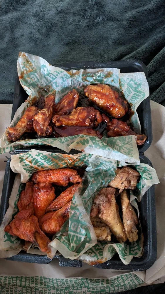 Wingstop food and storefront view at 2211 E. Franklin Blvd in Gastonia, North Carolina