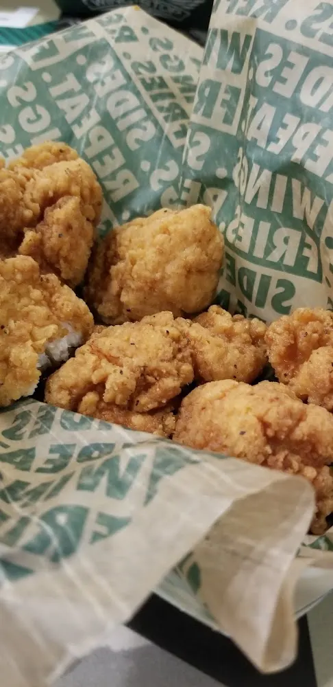 Wingstop food and storefront view at 2296 US Highway 70 SE in Hickory, North Carolina