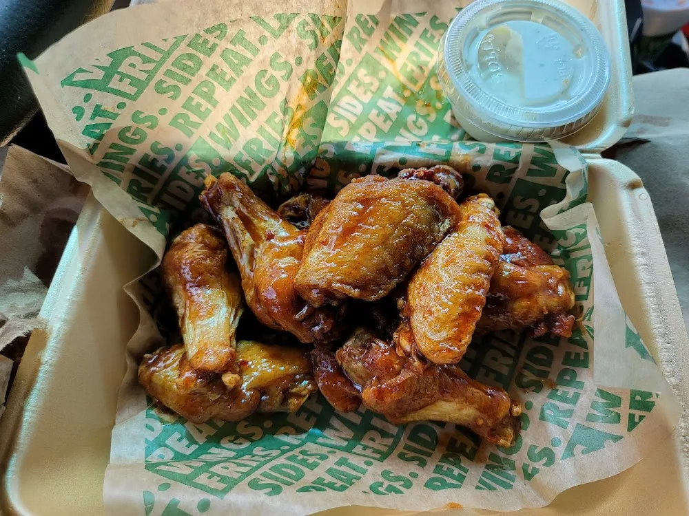Wingstop food and storefront view at 4205 W Wendover Ave in Greensboro, North Carolina