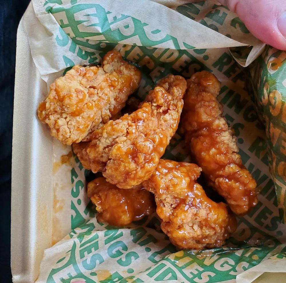 Wingstop food and storefront view at 3010 Western Blvd in Jacksonville, North Carolina