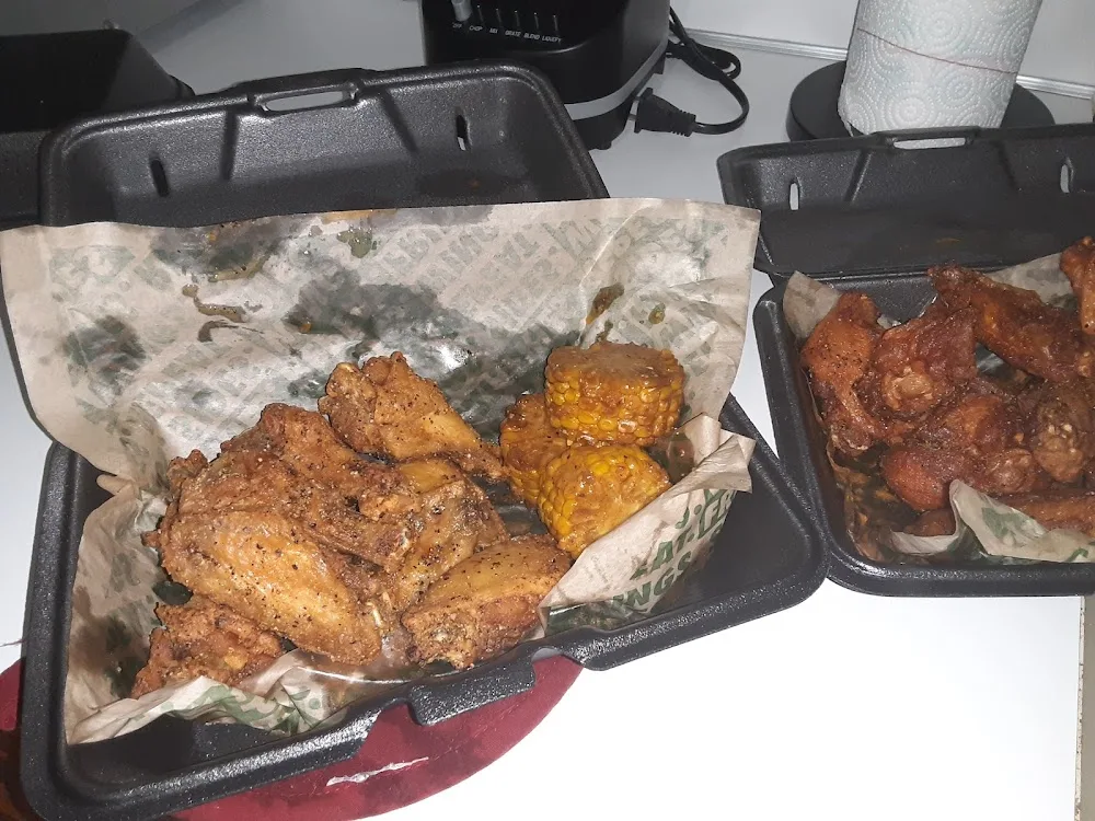 Wingstop food and storefront view at 2221 Roxie Street in Kannapolis, North Carolina