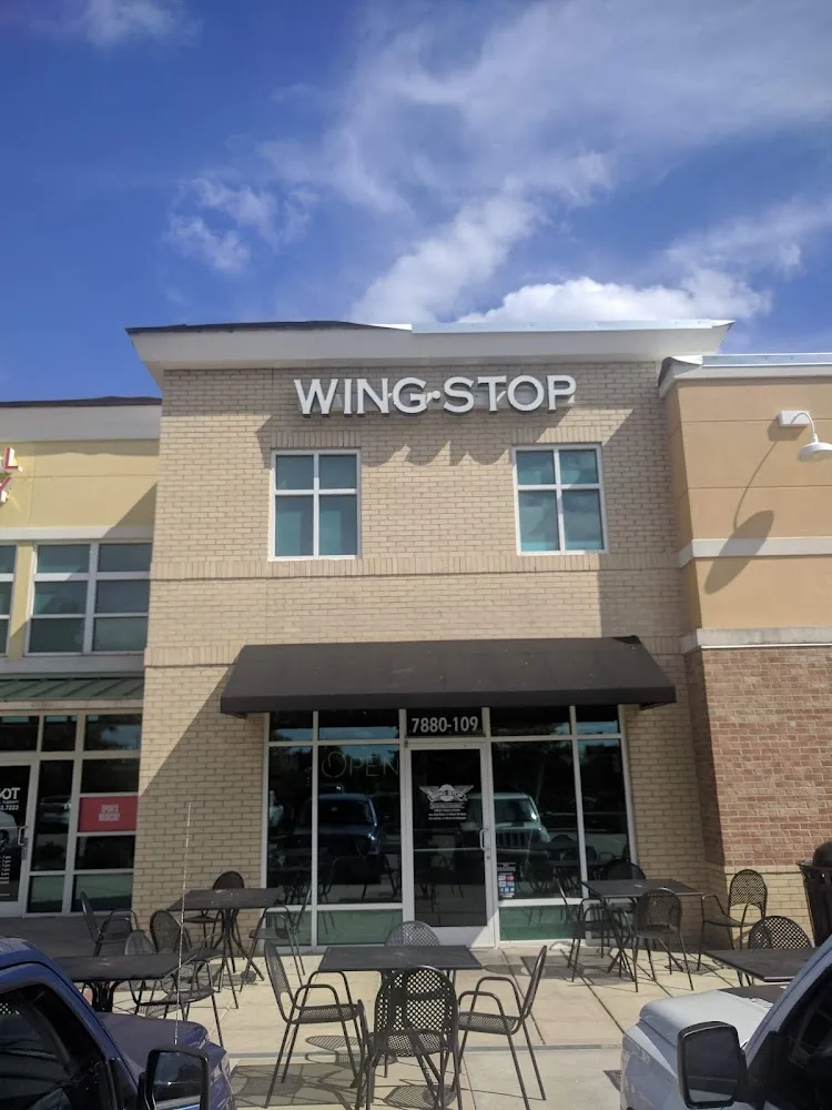 Wingstop food and storefront view at 7880 Alexander Promenade Pl in Raleigh, North Carolina