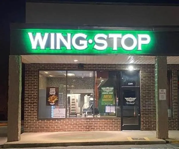 Wingstop food and storefront view at 3209 Avent Ferry Rd. in Raleigh, North Carolina