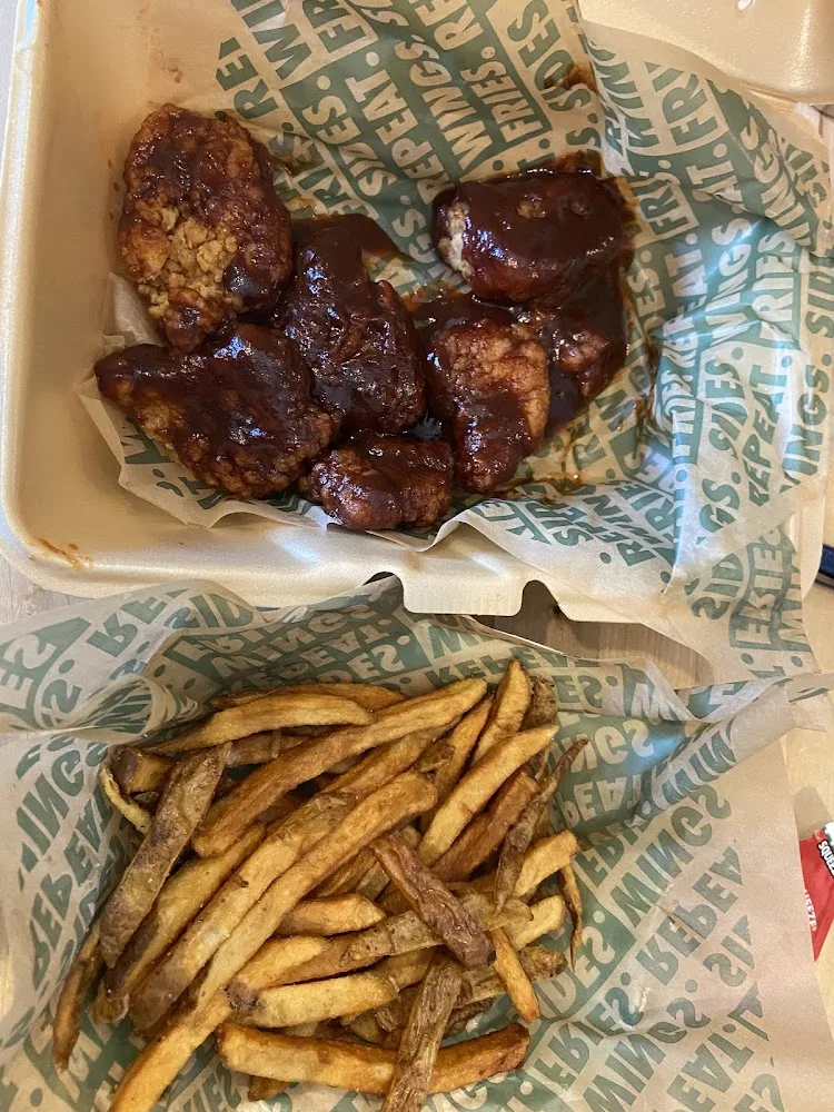 Wingstop food and storefront view at 2801 Pine Lake Rd in Lincoln, Nebraska