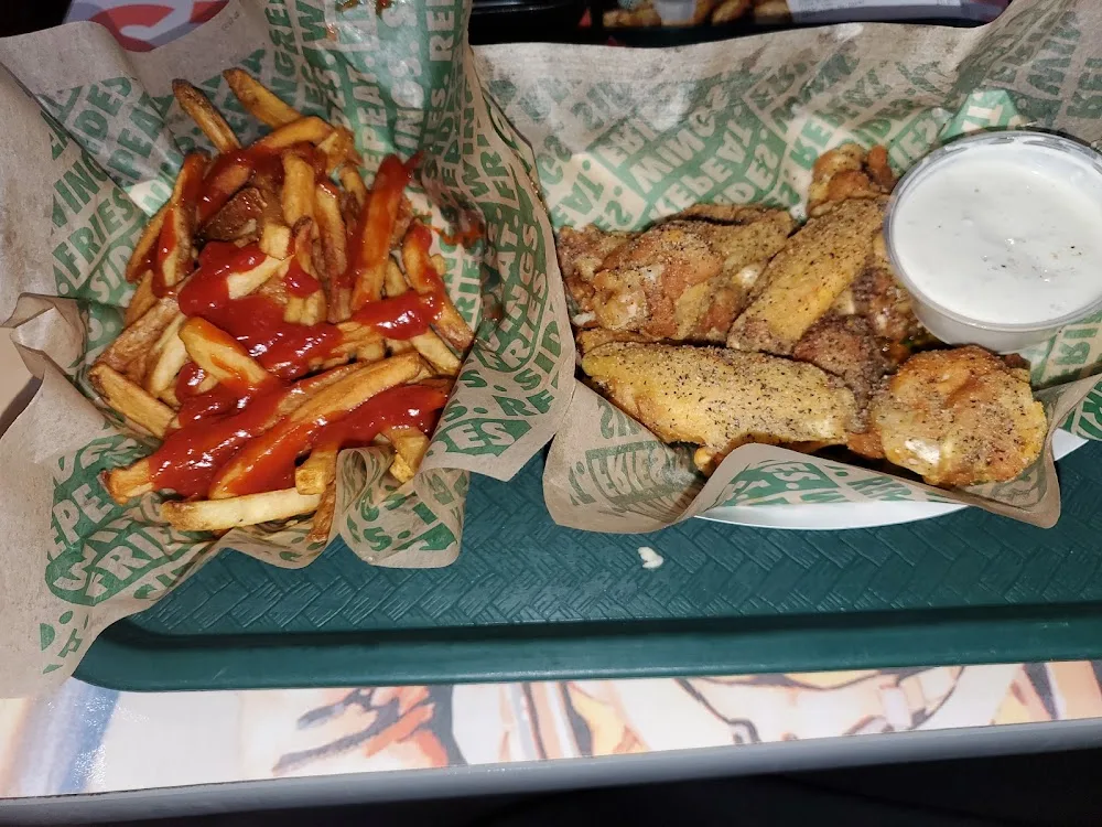 Wingstop food and storefront view at 1578 Main Ave in Clifton, New Jersey