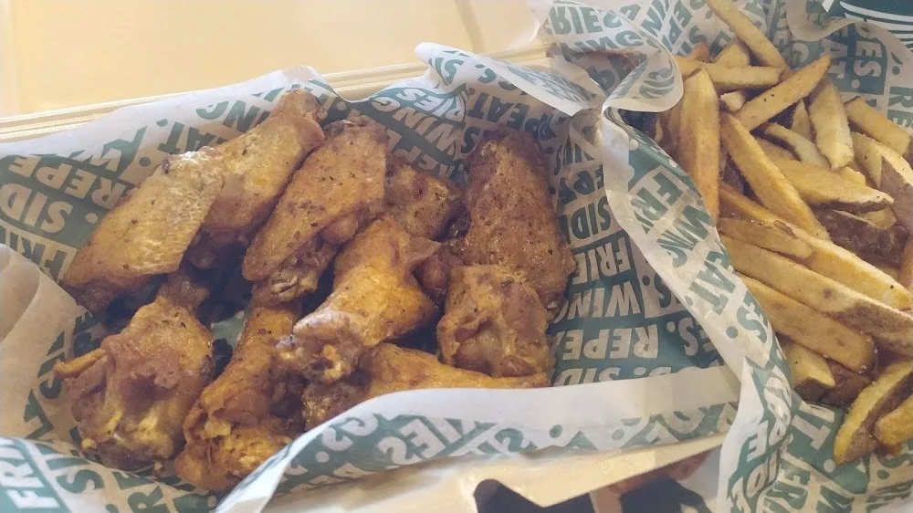 Wingstop food and storefront view at 1244 McCarter Hwy in Newark, New Jersey