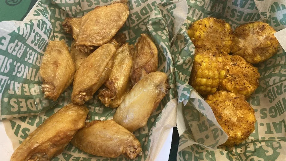 Wingstop food and storefront view at 1 Route 37 West in Toms River, New Jersey