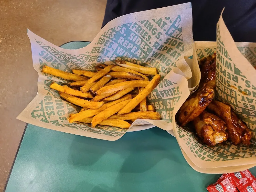 Wingstop food and storefront view at 1300 S . White Sands Blvd Suite B in Alamogordo, New Mexico