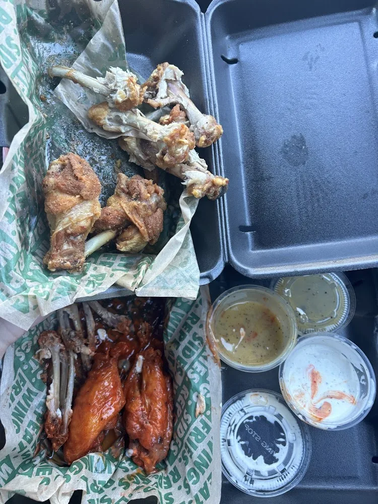 Wingstop food and storefront view at 3113-4 National Parks Hwy in Carlsbad, New Mexico