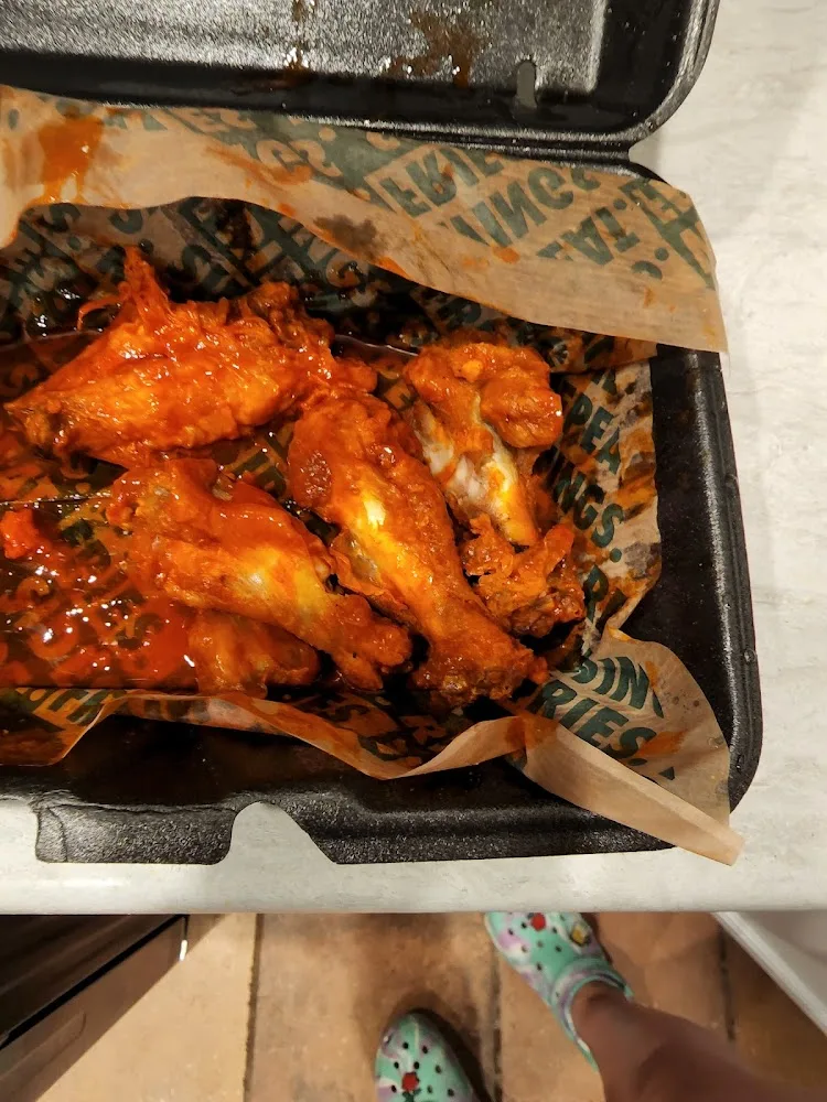 Wingstop food and storefront view at 251 98th St. NW Ste D in Albuquerque, New Mexico