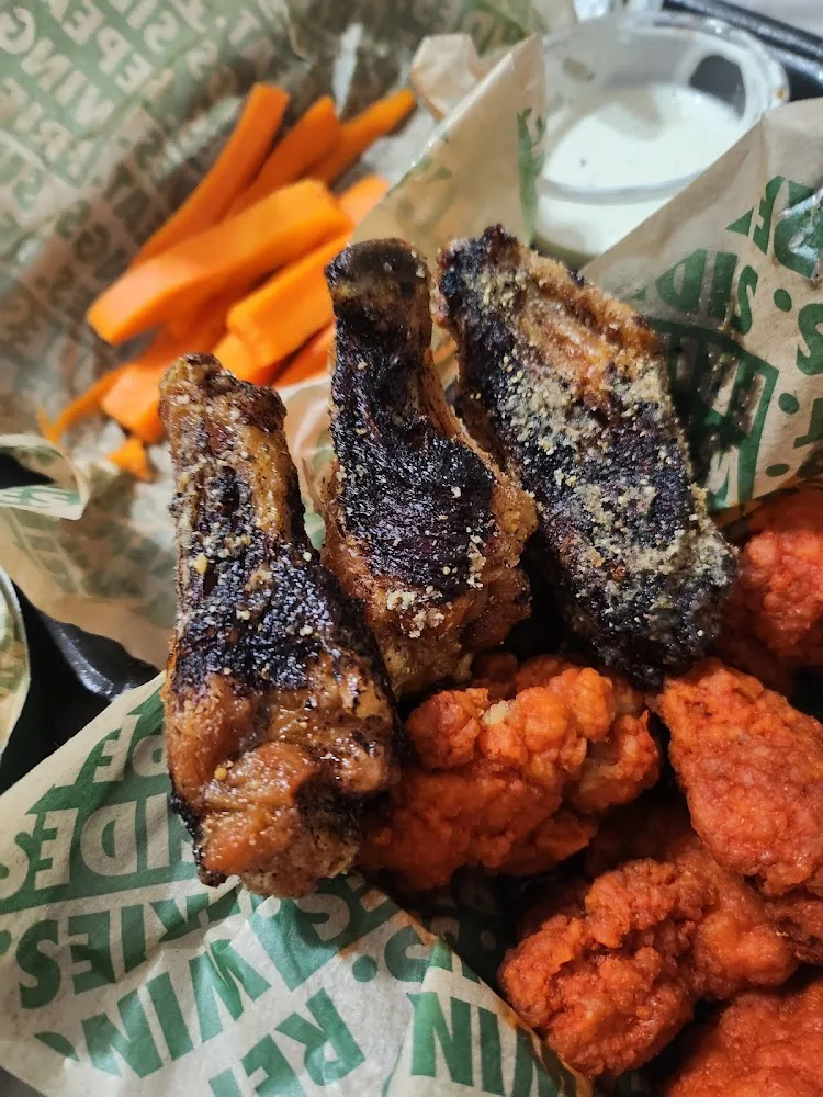 Wingstop food and storefront view at 3608 N. Prince St. Ste A in Clovis, New Mexico