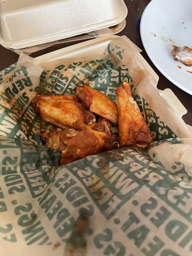 Wingstop food and storefront view at 3030 E Main St in Farmington, New Mexico