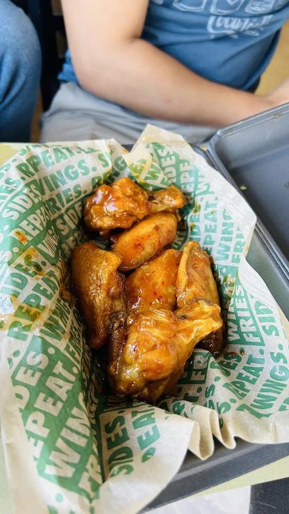 Wingstop food and storefront view at 3910 S Maryland Pkwy in Las Vegas, Nevada