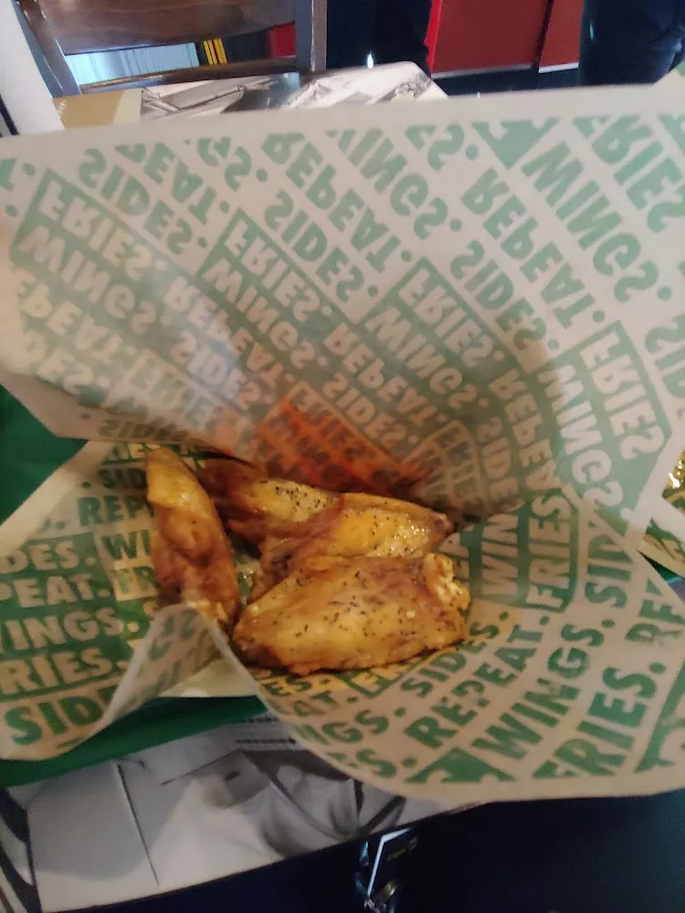 Wingstop food and storefront view at 5100 Mae Anne Ave Ste 4 in Reno, Nevada
