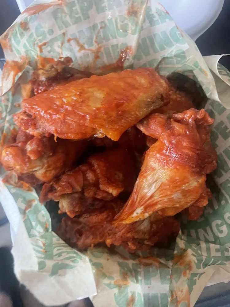 Wingstop food and storefront view at 356 E 149th St in Bronx, New York