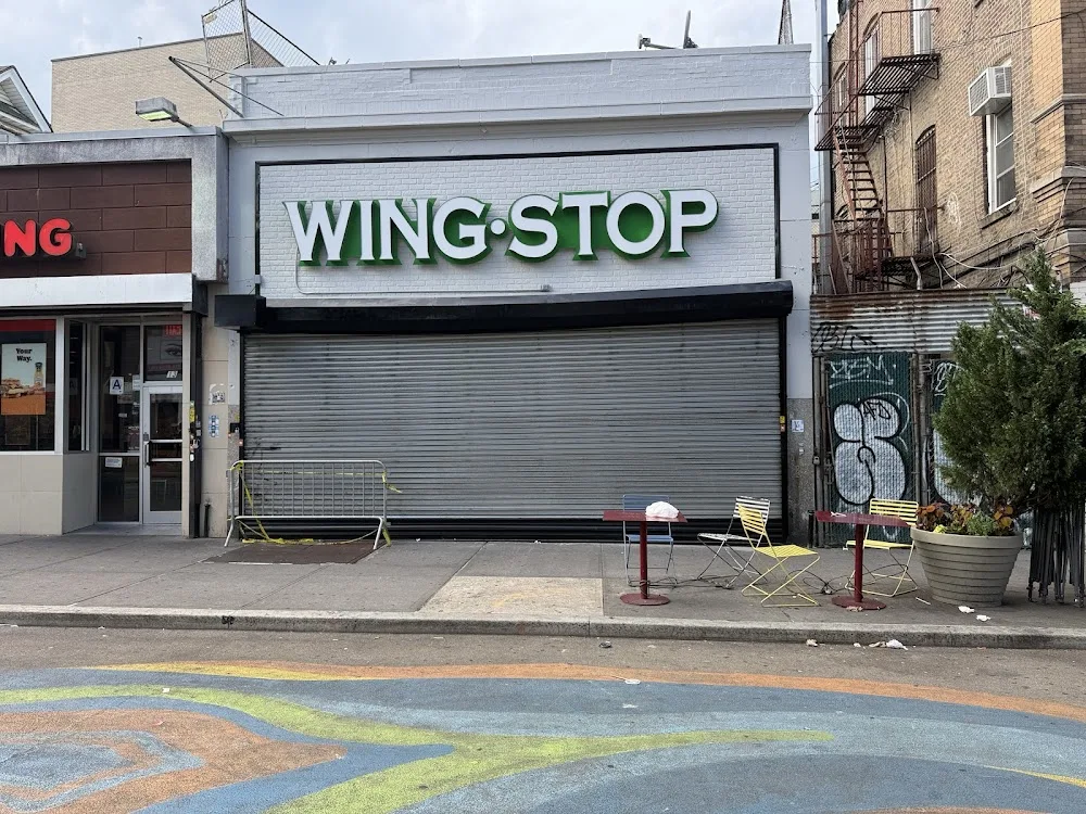 Wingstop food and storefront view at 3 Hillel Pl in Brooklyn, New York
