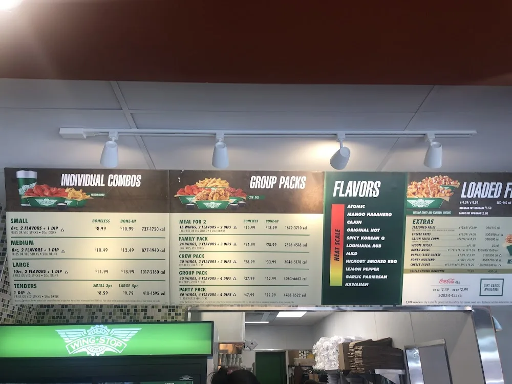Wingstop food and storefront view at 747 E Gunhill Road in Bronx, New York