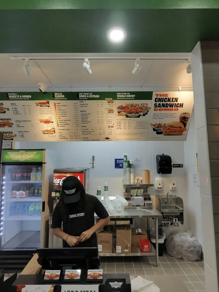 Wingstop food and storefront view at 3 Hillel Pl in Brooklyn, New York