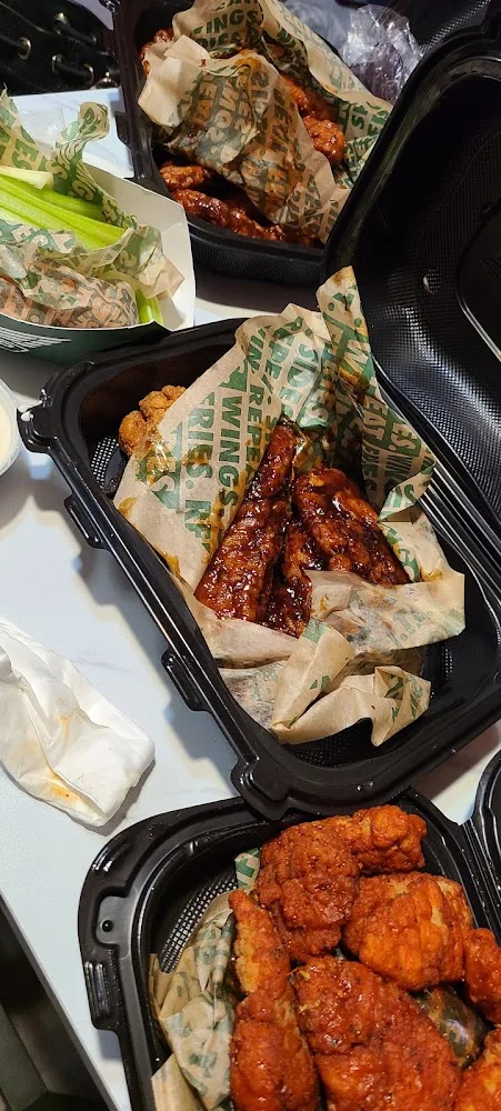 Wingstop food and storefront view at 240 Flatbush Ave in Brooklyn, New York