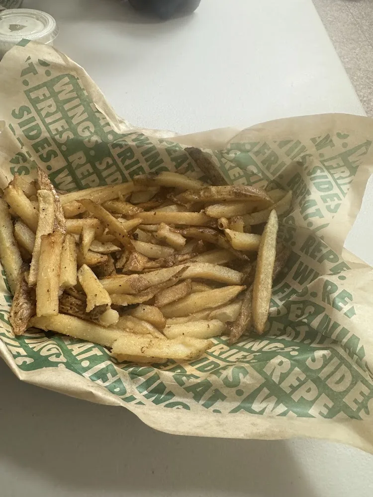 Wingstop food and storefront view at 5802 5th Ave in Brooklyn, New York