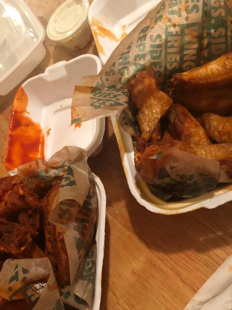 Wingstop food and storefront view at 1270 Fulton St in Brooklyn, New York