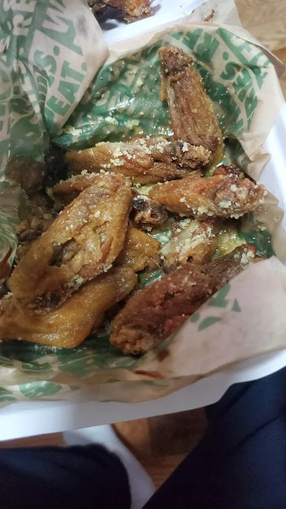 Wingstop food and storefront view at 946 Flatbush Ave in Brooklyn, New York