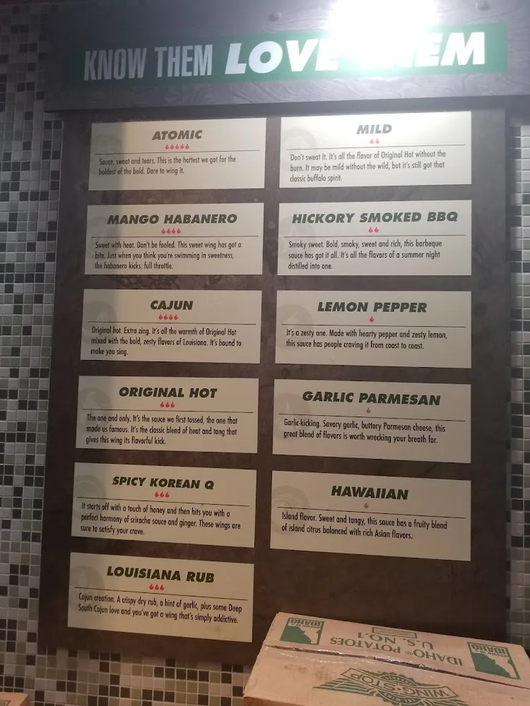 Wingstop food and storefront view at 700 Utica Ave in Brooklyn, New York