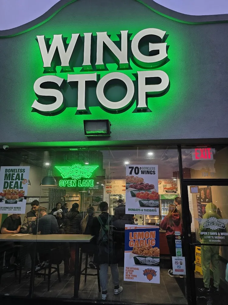 Wingstop food and storefront view at 104-21 Queens Blvd in Forest Hills, New York