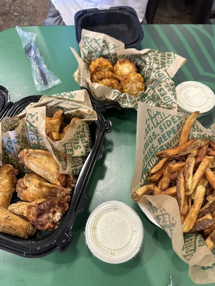 Wingstop food and storefront view at 2925 Hempstead Turnpike in Levittown, New York
