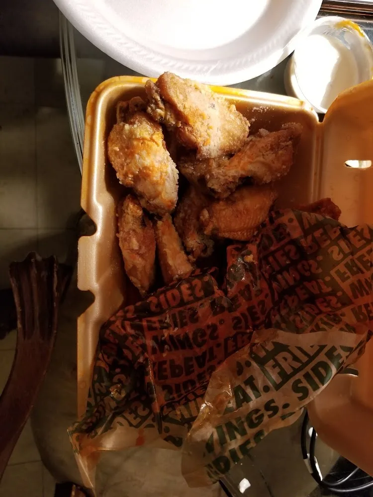 Wingstop food and storefront view at 400 Route 211 E Ste 21 in Middletown, New York
