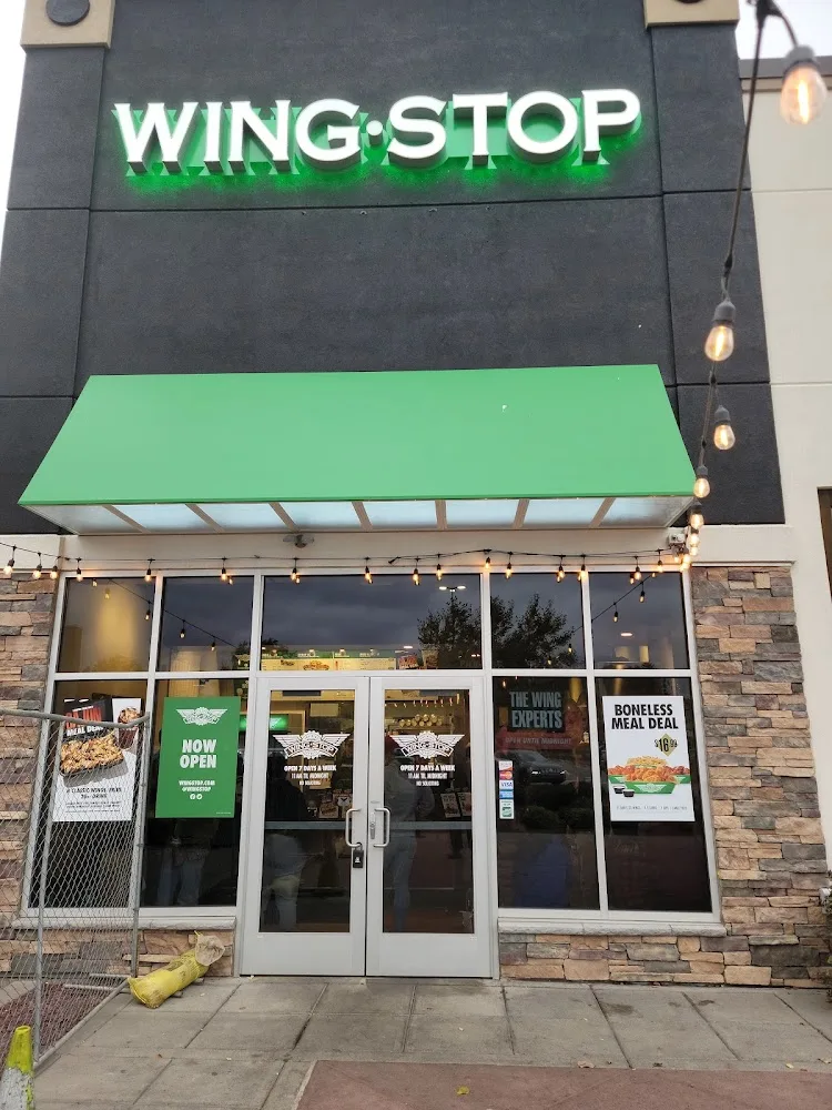Wingstop food and storefront view at 110 Greece Ridge Center Dr. in Rochester, New York