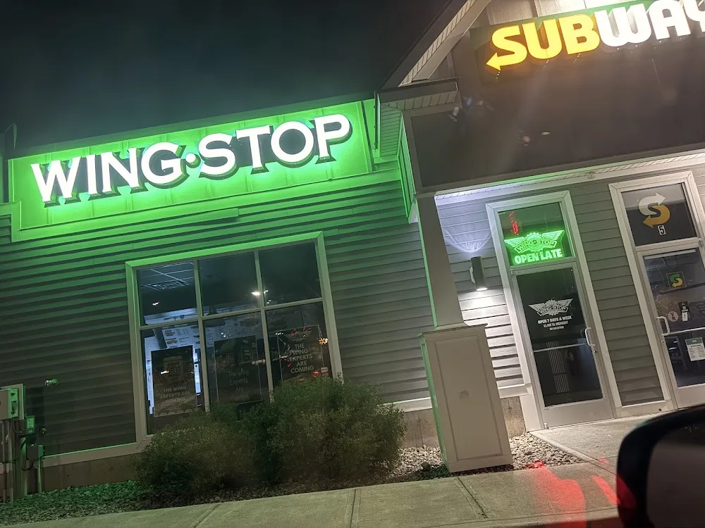 Wingstop food and storefront view at 894 US-9 in Queensbury, New York