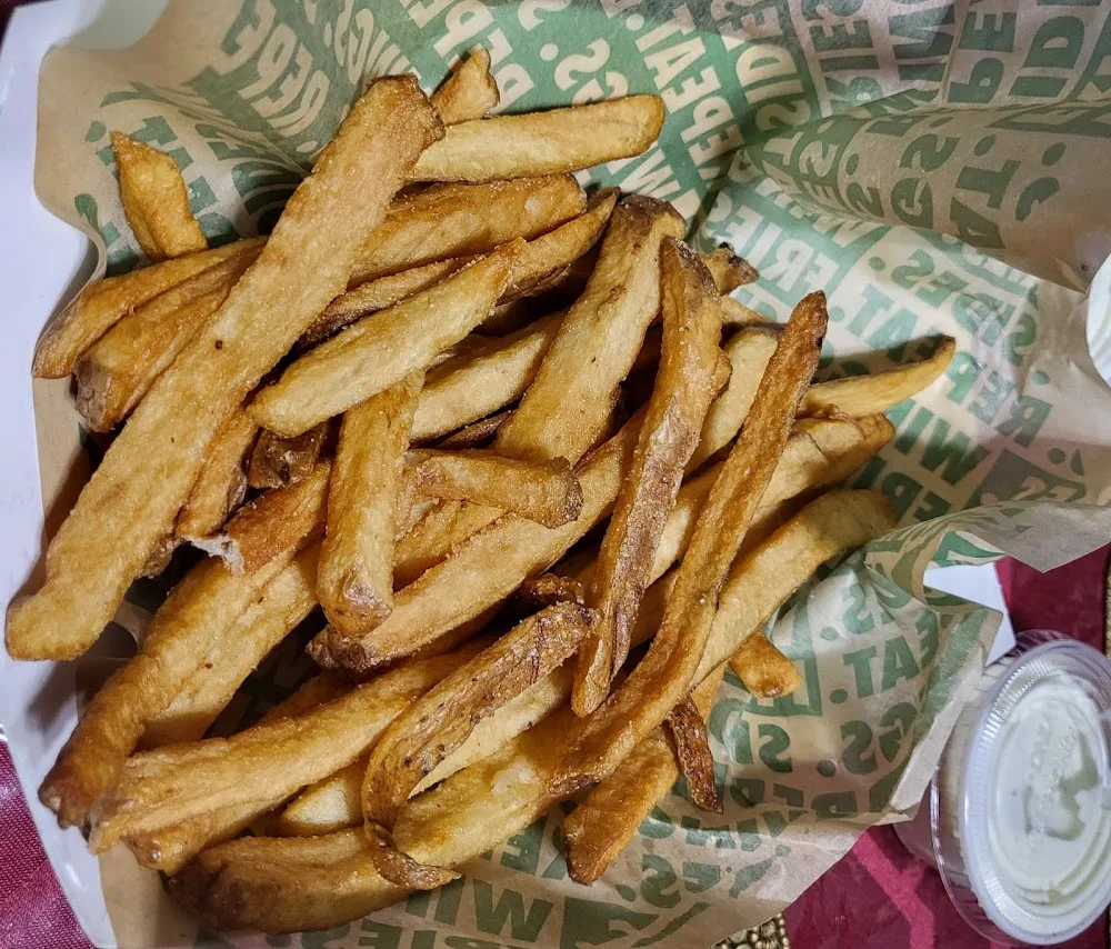 Wingstop food and storefront view at 102 - 14 Atlantic Ave in Queens, New York