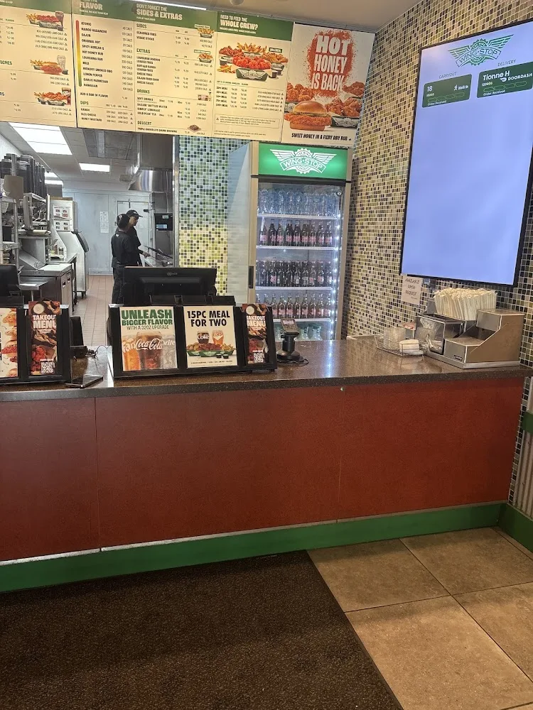 Wingstop food and storefront view at 40-11 Queens Blvd. in Sunnyside, New York