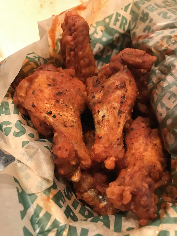 Wingstop food and storefront view at 8641 W. Ridgewood Dr. in Parma, Ohio