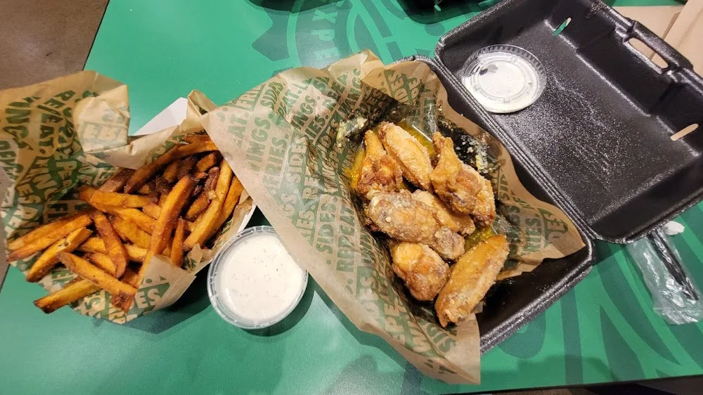 Wingstop food and storefront view at 717 S. I-35 Service Rd. in Moore, Oklahoma
