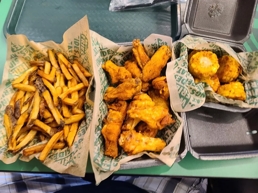Wingstop food and storefront view at 12916 E. 86th St. N. in Owasso, Oklahoma