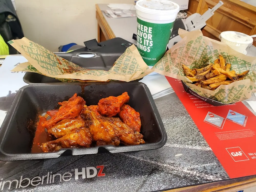 Wingstop food and storefront view at 312 N. Perkins Rd in Stillwater, Oklahoma