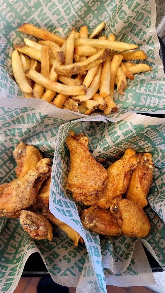 Wingstop food and storefront view at 7104 S. Memorial Drive in Tulsa, Oklahoma