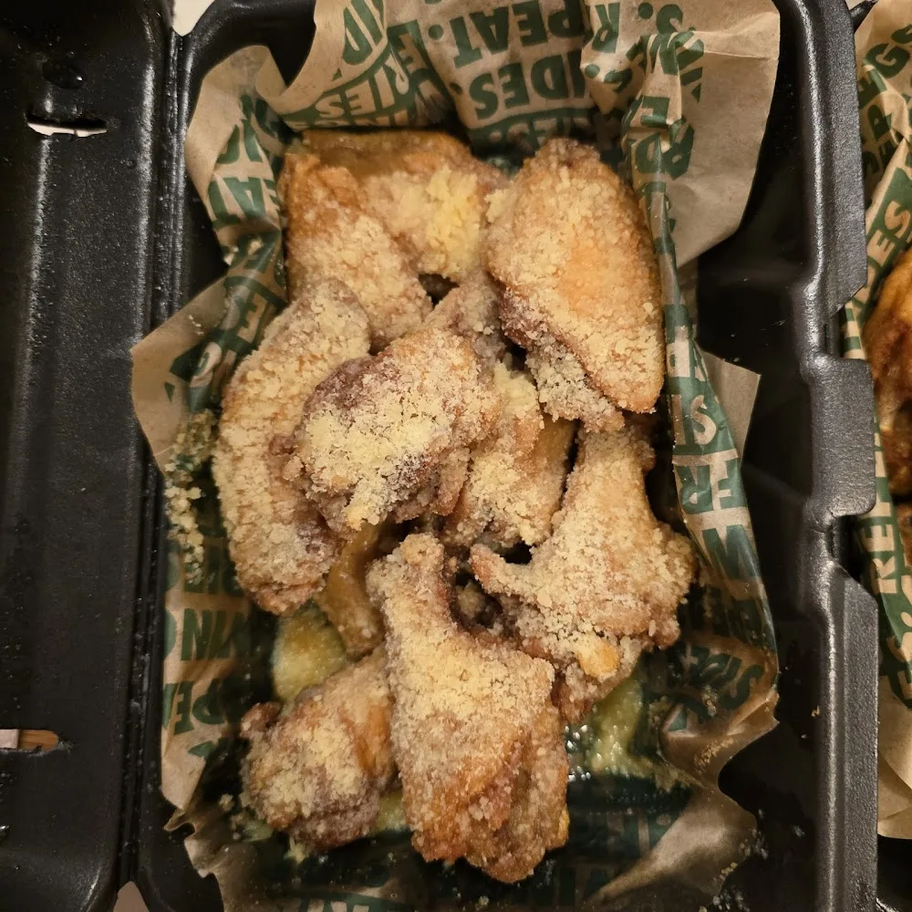 Wingstop food and storefront view at 2502 Willamette St. in Eugene, Oregon