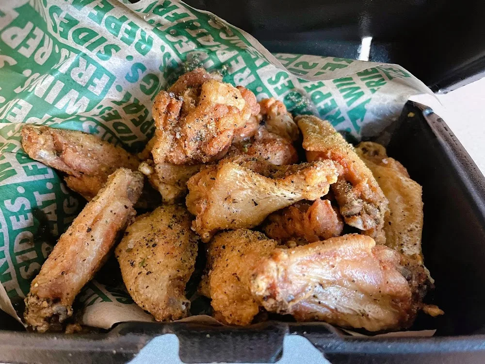 Wingstop food and storefront view at 11705 SW Pacific Hwy in Tigard, Oregon
